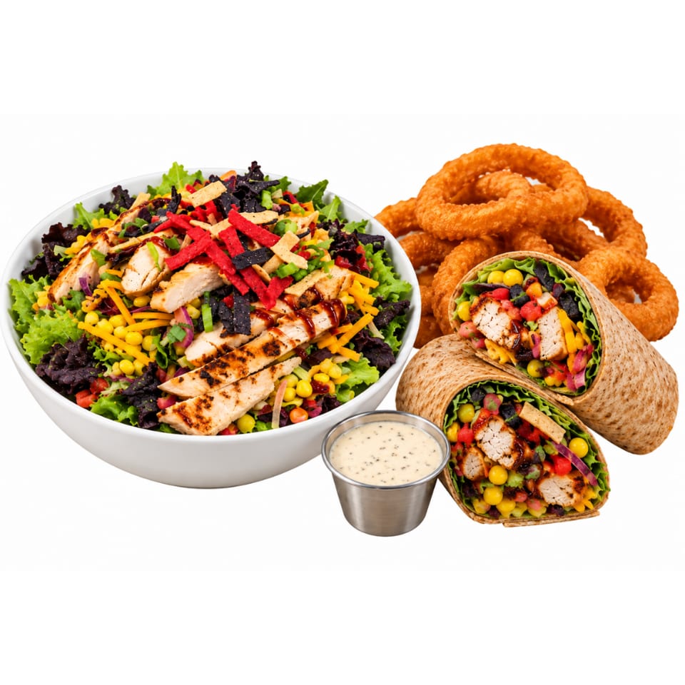 Grilled chicken salad, stuffed wraps, crispy onion rings, and creamy dipping sauce arranged on a white background.