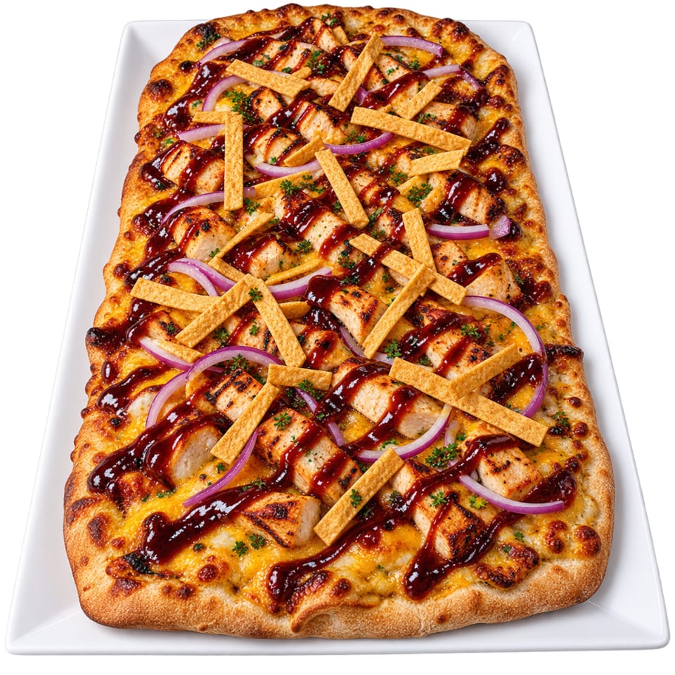 Rectangular barbecue chicken flatbread topped with red onion, crispy strips, herbs, and drizzled barbecue sauce on a white platter.
